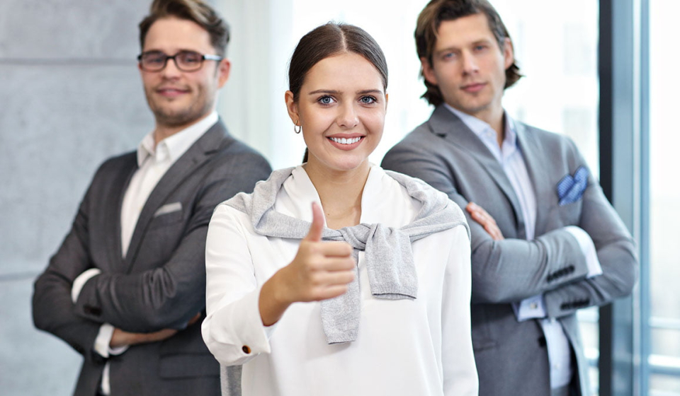 Group of business people sharing ideas in modern office